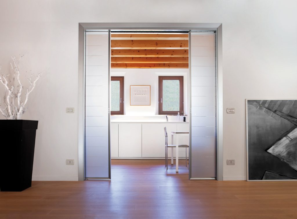 Porte coulissante double vantaux Extension avec porte en verre et aluminium