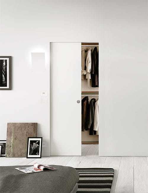 Syntesis Line porte coulissante invisible châssis robuste, durable et breveté par ECLISSE