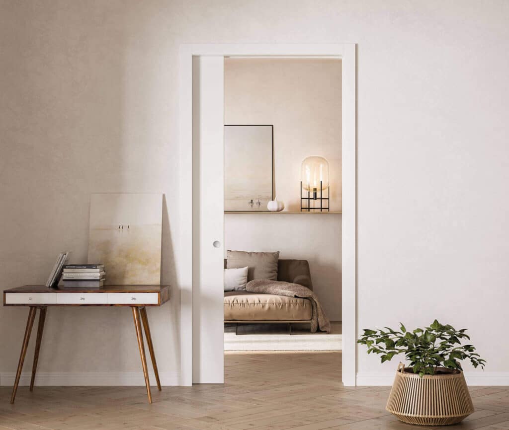 Porte coulissante avec habillage et porte bois blanche avec châssis Unique par ECLISSE
