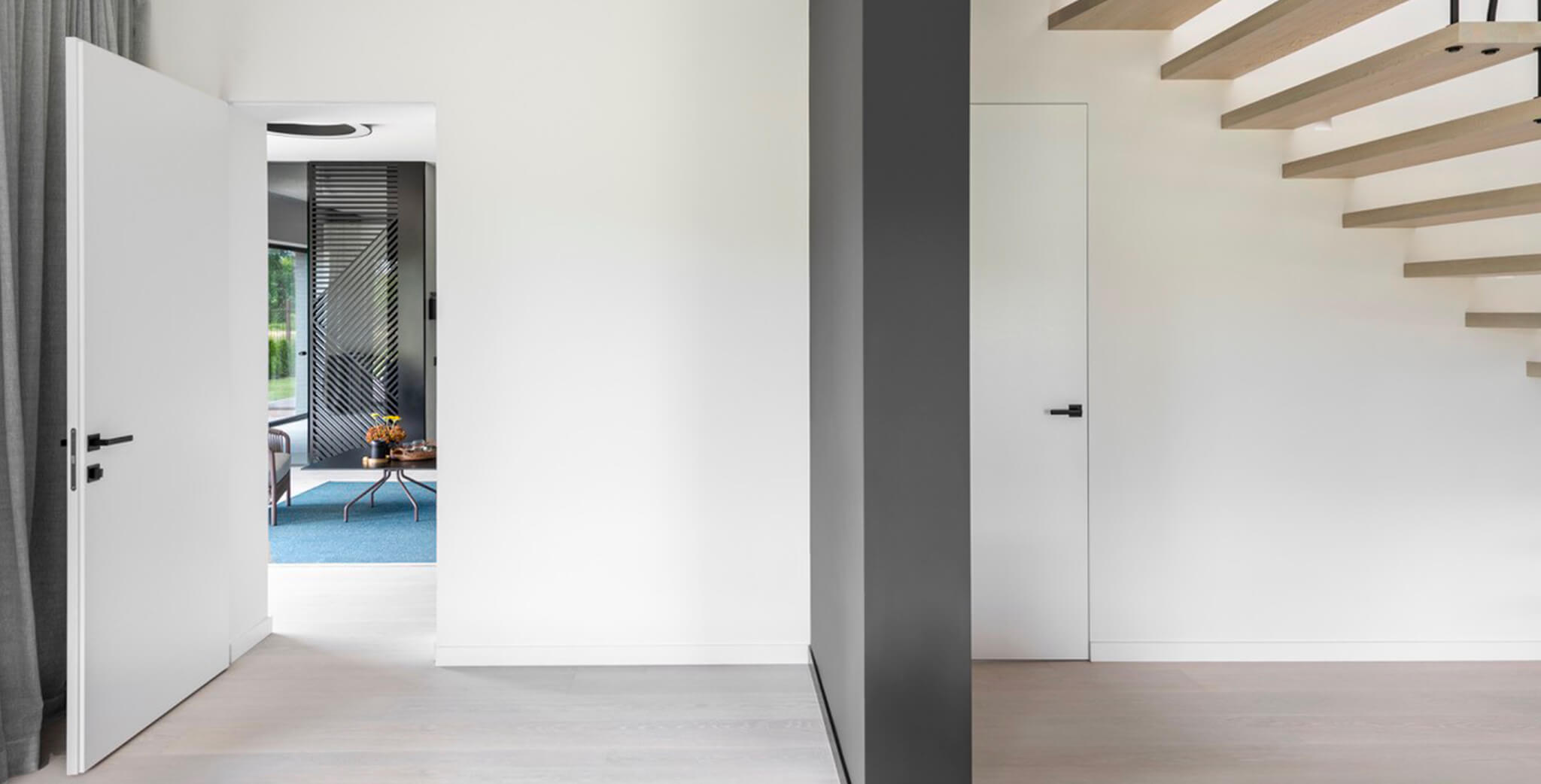 Porte battante affleurante ECLISSE une cloison lisse et libre de tout artifice