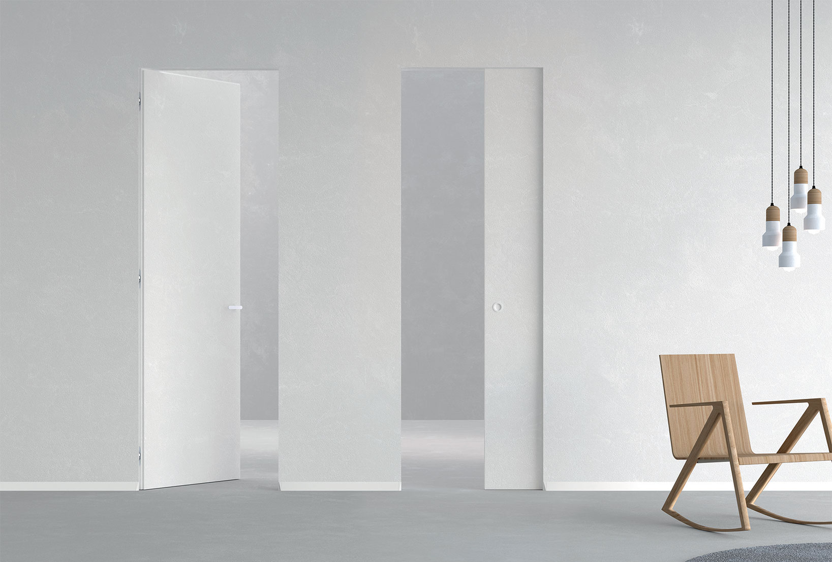 Syntesis Line une porte coulissante invisible associée à la porte battante affleurante Syntesis Battant. Toute deux issue de la Syntesis Collection