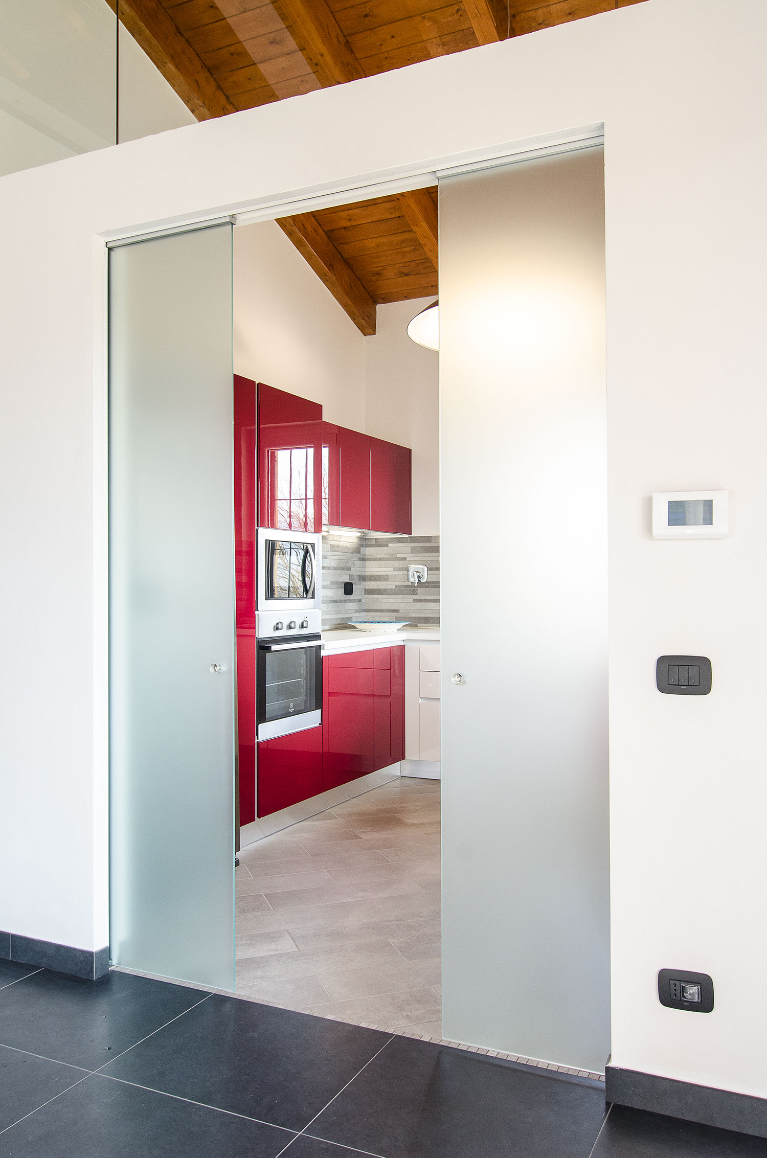 Double porte coulissante entre la cuisine et le salon