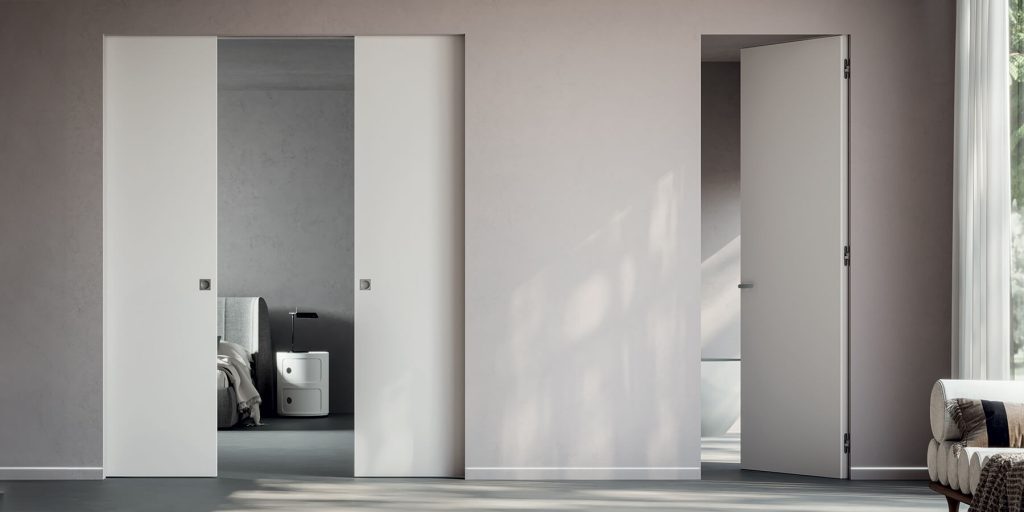 Syntesis Collection porte coulissante double vantaux invisible et porte battante affleurante